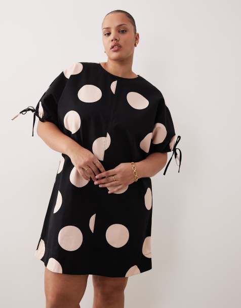 ASOS DESIGN Curve crew neck mini dress with tie sleeve detailing in polka dots - view 1