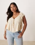 [ASOS Curve] ASOS DESIGN Curve crinkle flutter sleeve open back top in cream-White 20 Cream