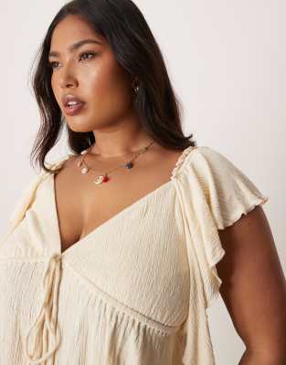 ASOS DESIGN Curve crinkle flutter sleeve open back top in cream