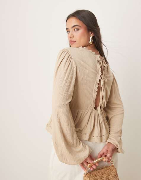 ASOS DESIGN Curve crinkle long sleeve tie back embroidered hem top in stone - view 1