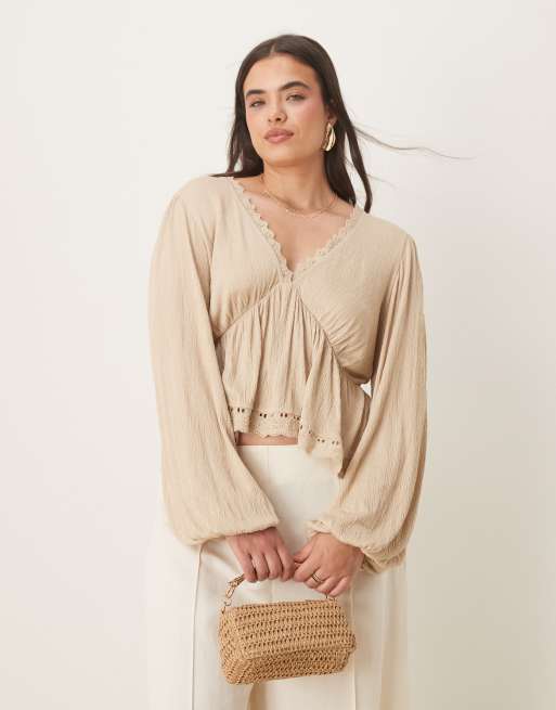 ASOS DESIGN Curve crinkle long sleeve tie back embroidered hem top in stone, 2 of 4