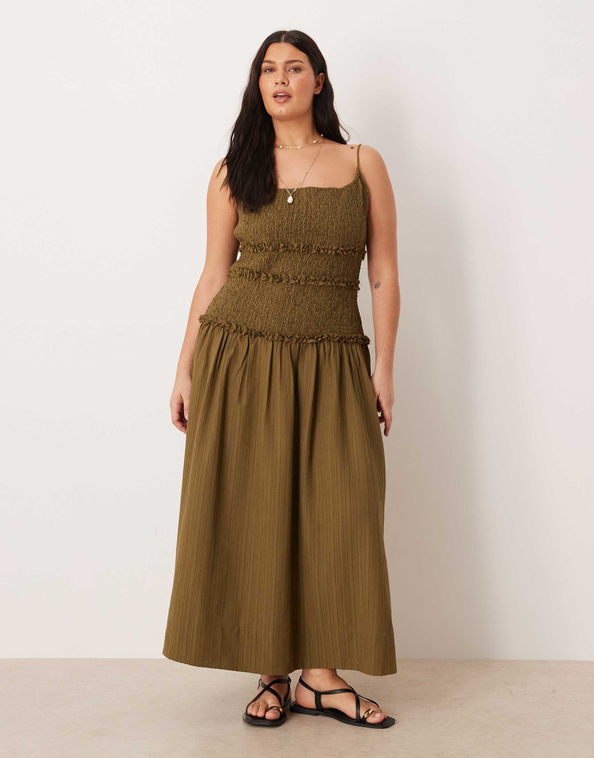 asos design curve crinkle maxi sundress with shirred dropped waist in olive