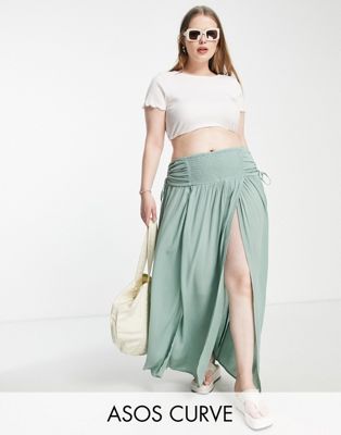 ASOS DESIGN Curve crinkle shirred waist maxi skirt with ruched sides in khaki - ASOS Price Checker