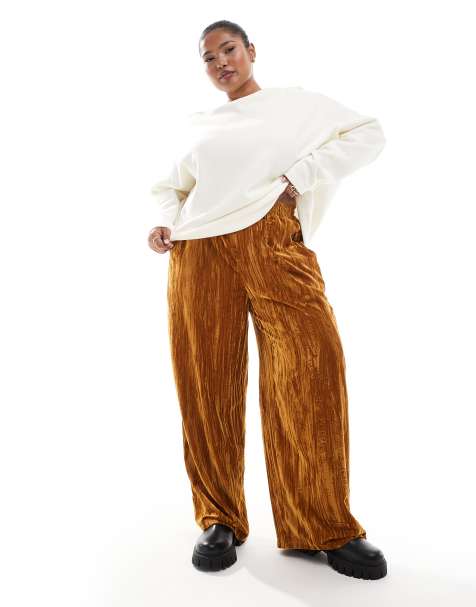 ASOS DESIGN Curve crinkle velvet pull on pants in gold - view 1