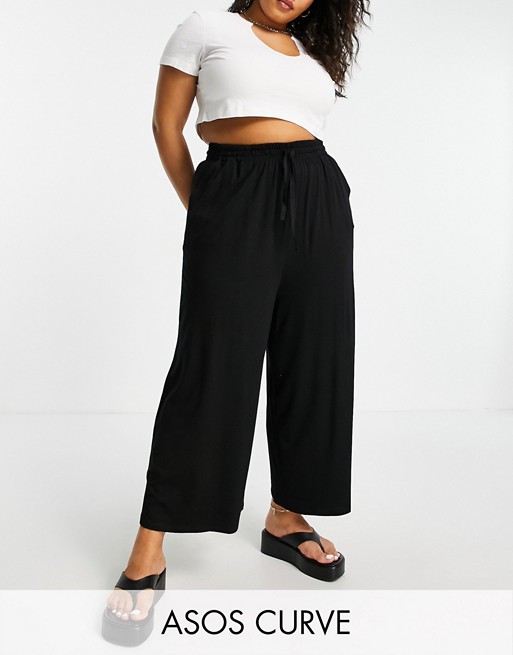 ASOS DESIGN Curve cropped drawstring wide leg trousers in black