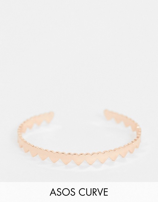 ASOS DESIGN Curve cuff bracelet in heart design in rose gold tone