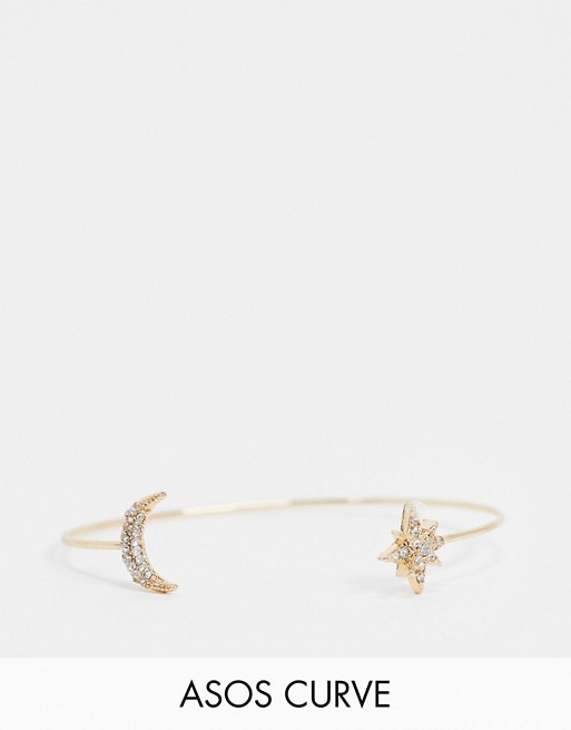 ASOS DESIGN Curve cuff bracelet with crystal moon and star ends in gold tone