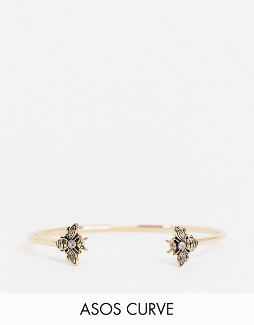 ASOS DESIGN Curve cuff bracelet with engraved crystal bee in gold tone