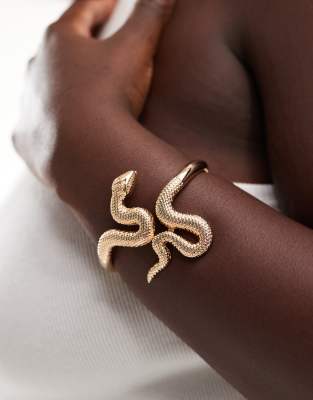 ASOS Curve ASOS DESIGN Curve cuff bracelet with snake detail in gold tone