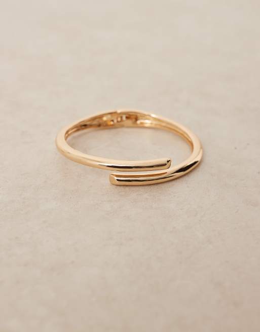 ASOS DESIGN Curve cuff bracelet with wrap detail in gold tone, 3 of 3