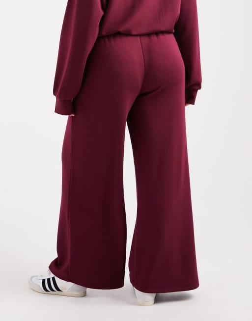ASOS DESIGN Curve cupro super wide leg trackies in burgundy, 4 of 5