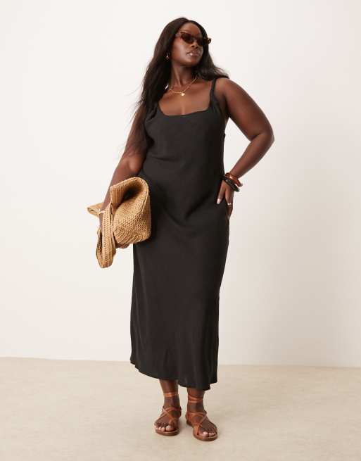 ASOS DESIGN Curve – Czarna sukienka maxi ze skosu na skręconych ramiączkach z domieszką lnu