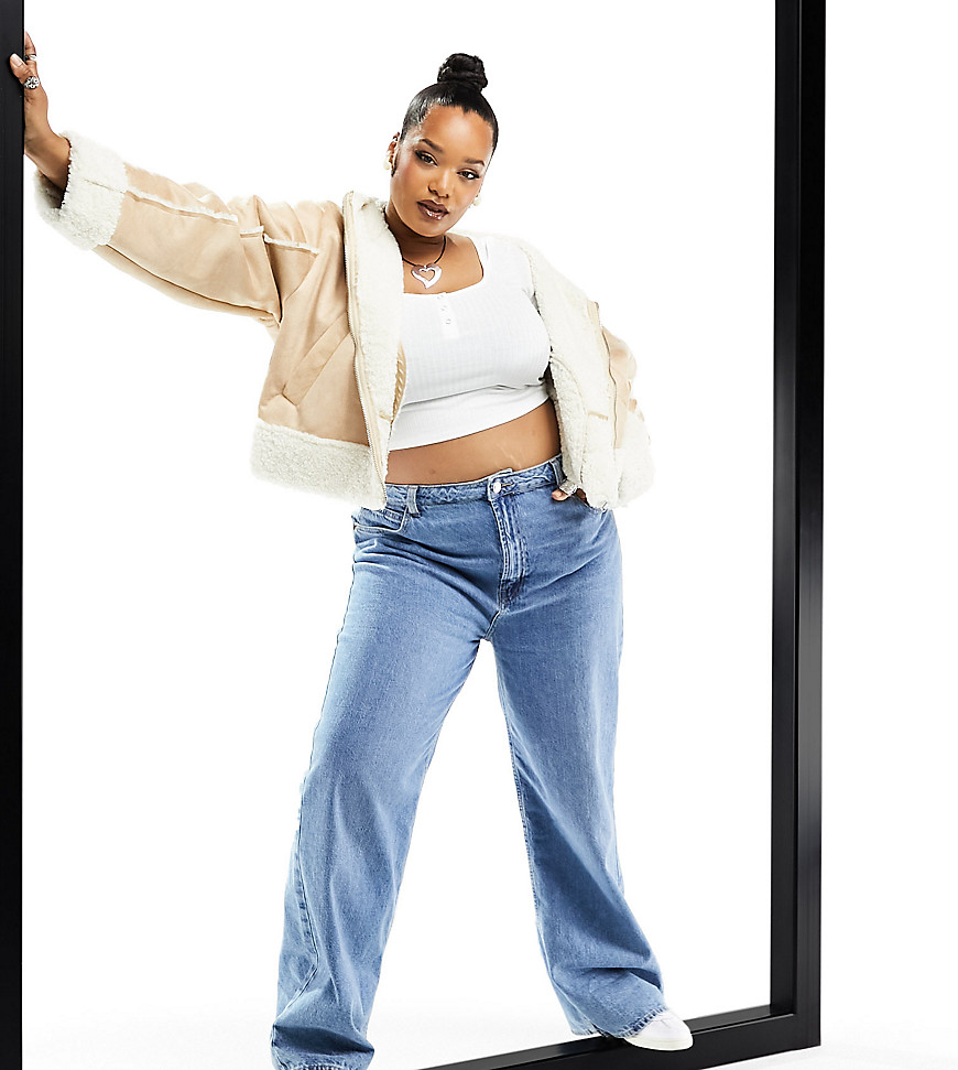 Jeans by ASOS Curve Denim of the decades Slim through the hips​ Wide-leg silhouette​ High rise Zip fly Five pockets