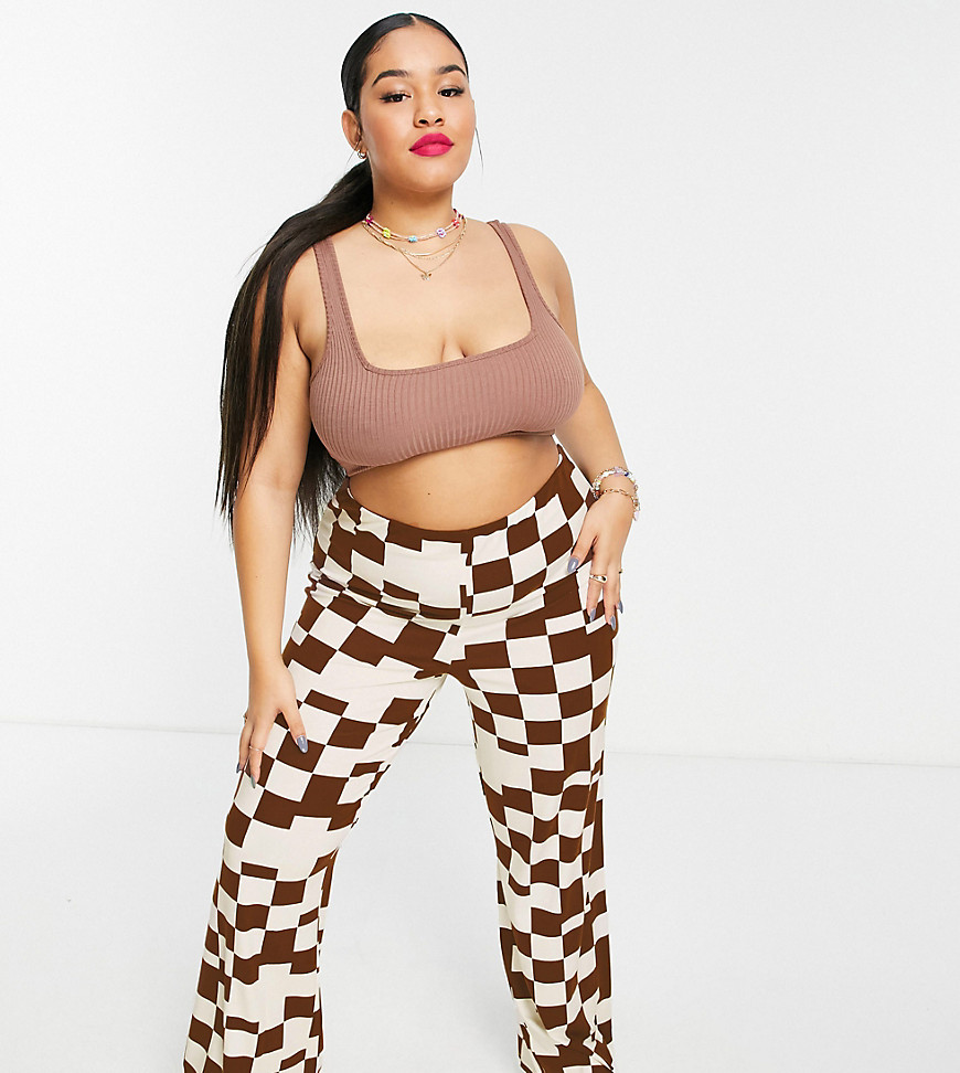 Plus-size trousers by ASOS DESIGN Part of our responsible edit All-over print High rise Elasticated waist Straight fit