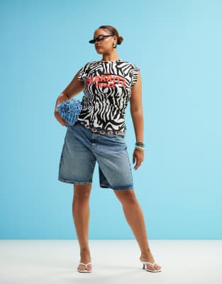 ASOS DESIGN Curve denim Bermuda shorts in mid wash blue