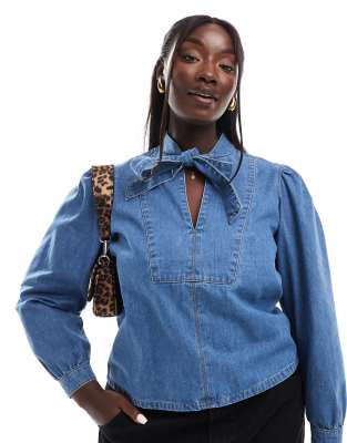 ASOS DESIGN Curve denim bow neck shirt in mid blue