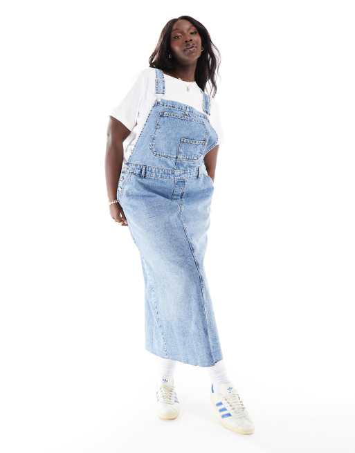 ASOS DESIGN Curve denim dungaree dress in midwash blue