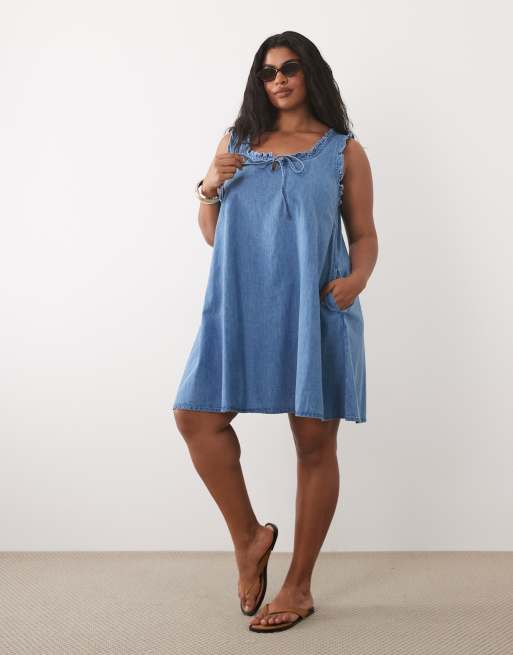 ASOS DESIGN Curve denim frill detail mini dress with pockets in mid blue, 3 of 4