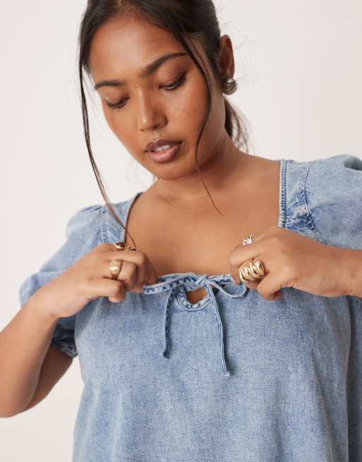ASOS DESIGN Curve denim mini dress with puff sleeves and tie detail in light wash