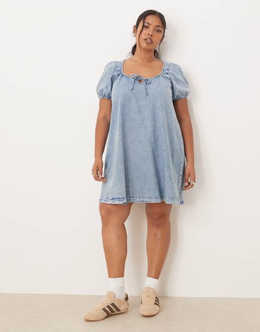 ASOS DESIGN Curve denim mini dress with puff sleeves and tie detail in light wash