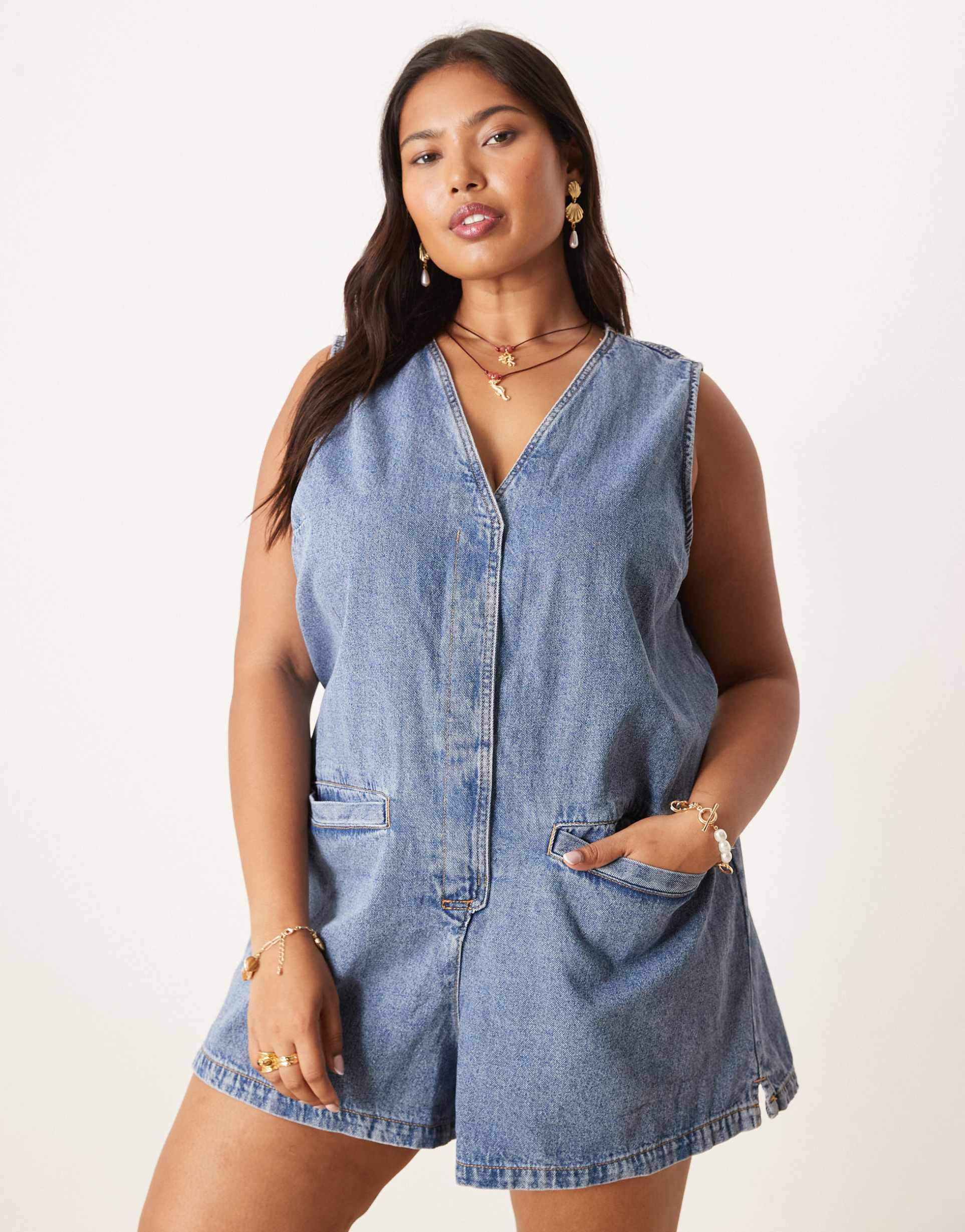 asos design curve denim romper with tie back in midwash blue