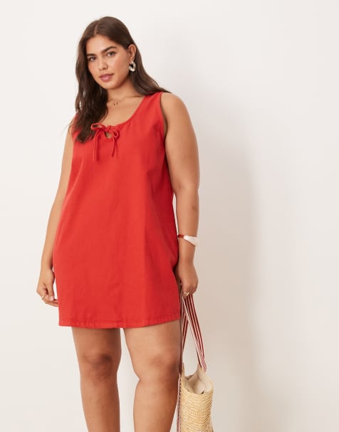 ASOS DESIGN Curve denim scoop mini dress with bow front in red - view 1