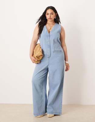ASOS Curve ASOS DESIGN Curve denim sleeveless jumpsuit with tie back in lightwash blue