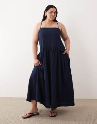 ASOS DESIGN Curve denim smock midi dress with side pockets in inky wash-Blue