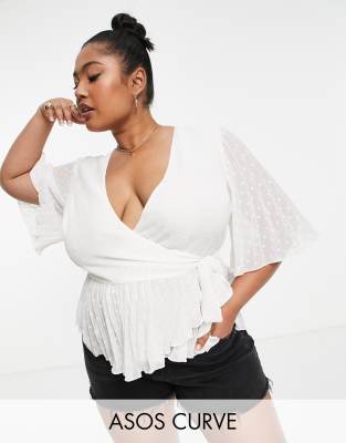 ASOS DESIGN Curve  dobby wrap short sleeve blouse with pleated peplum hem in ivory