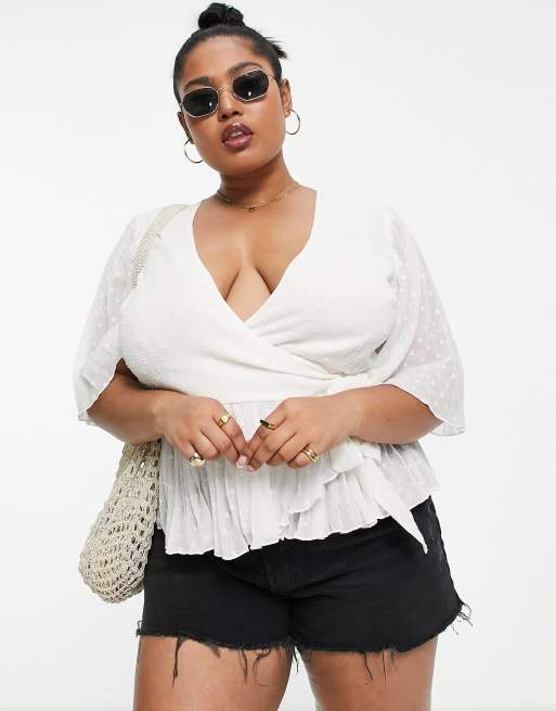 ASOS DESIGN Curve dobby wrap short sleeve blouse with pleated peplum hem in  ivory