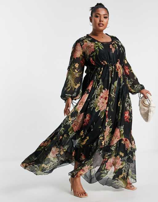 ASOS DESIGN Curve drape ruffle maxi dress with lace insert and tassel detail in black floral print ASOS