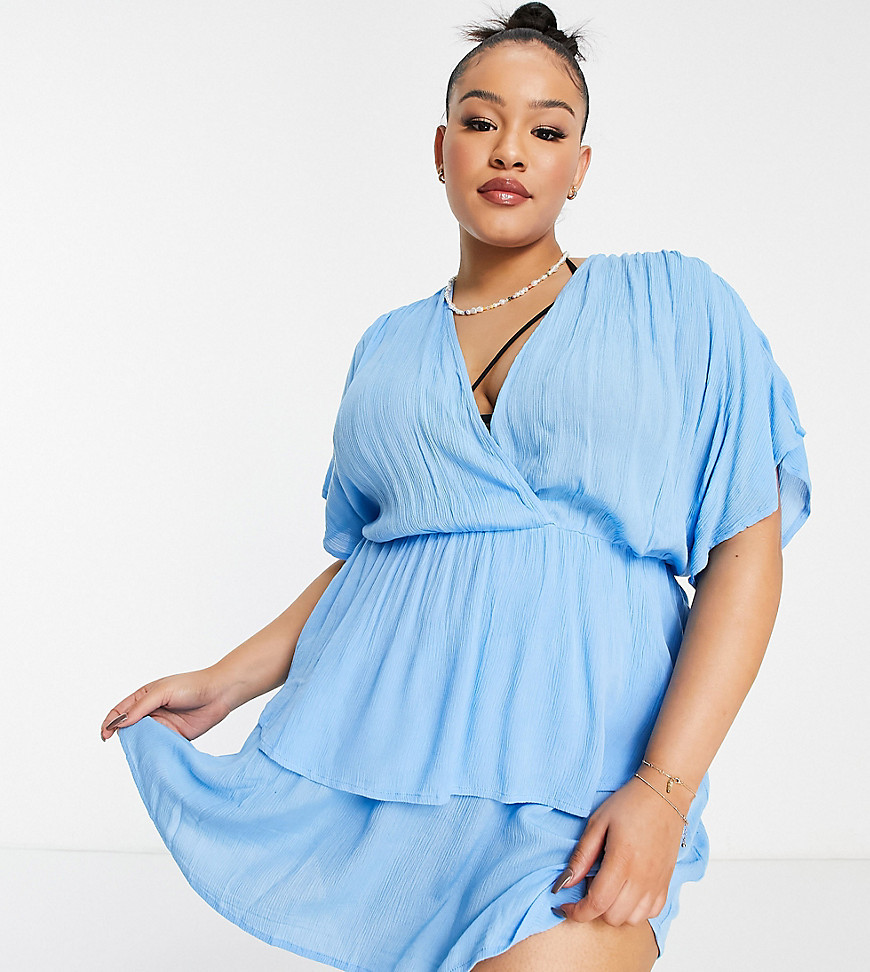 Plus-size beach cover-up by ASOS DESIGN Dreaming of the beach Wrap front Short sleeves Tie-back detail Tiered skirt Regular fit