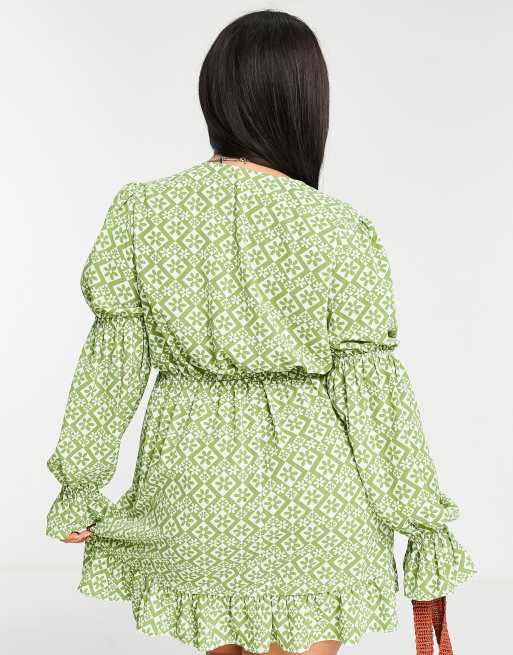 ASOS DESIGN Curve elasticated sleeve tie neck mini dress in green geo floral print, 2 of 4