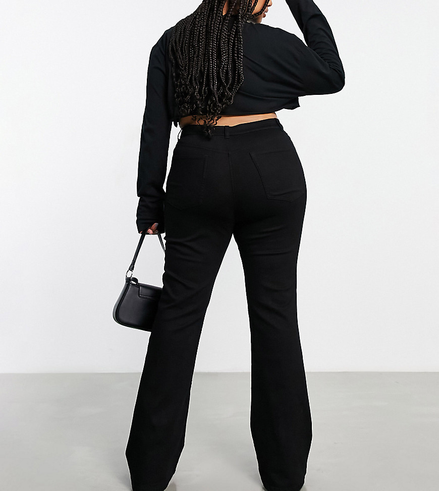 ASOS DESIGN Curve exclusive power stretch flared jeans in black