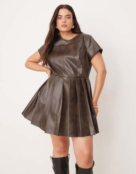 ASOS DESIGN Curve faux leather seamed mini dress with pleat hem in chocolate - view 1