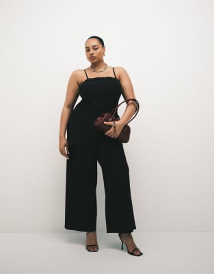 ASOS DESIGN Curve - Figurbetonte, elegante Hose aus Twill in Schwarz mit Wickeldetail und weitem Bein
