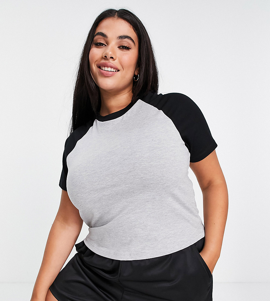 Plus-size top by ASOS DESIGN Part of our responsible edit Crew neck Contrast raglan sleeves Cropped length Slim fit