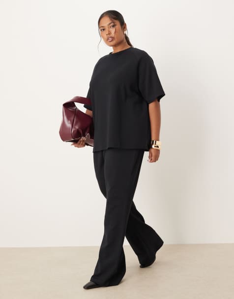 ASOS DESIGN Curve - Flare-joggingbroek met interlock-naden in zwart, deel van curve co-ord set - view 1