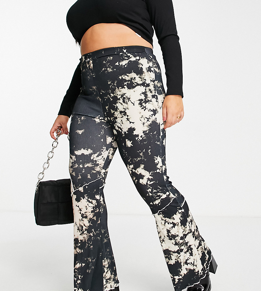 Plus-size trousers by ASOS DESIGN These trousers on repeat Exposed seam design All-over tie-dye print High rise Elasticated waist Flared slim fit