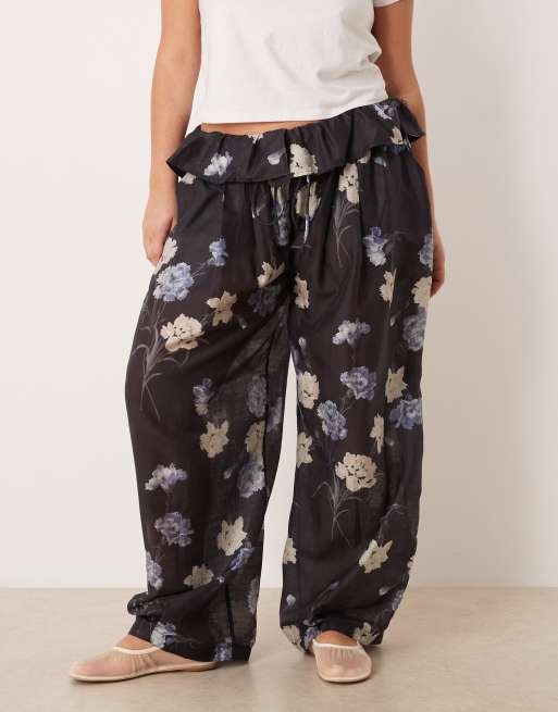 ASOS DESIGN Curve – Fließende Hose in Schwarz mit Blumenmuster, 3 von 5