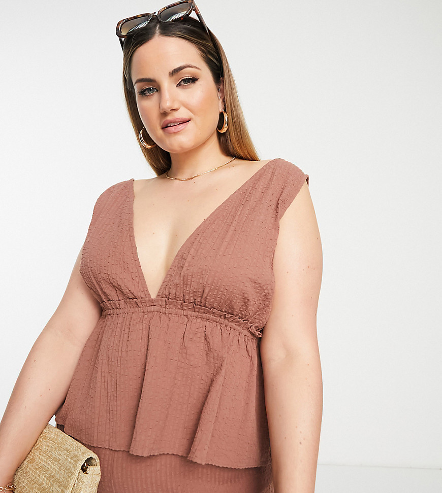 Plus-size top by ASOS DESIGN Part of a co-ord set Trousers sold separately Plunge neck Sleeveless style Regular fit