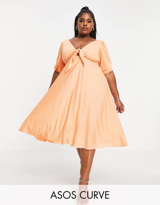 ASOS DESIGN Curve - Geplooide midi skaterjurk met gestrikte voorkant en pofmouwen in koraal