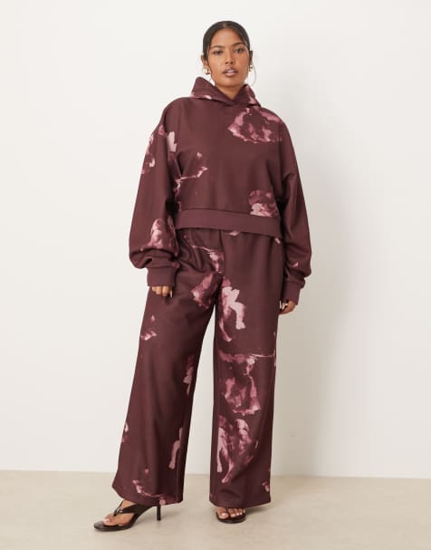 ASOS DESIGN Curve – Gerade geschnittene Jogginghose in Pflaume mit All-over-Blumenmuster, Kombiteil - view 1