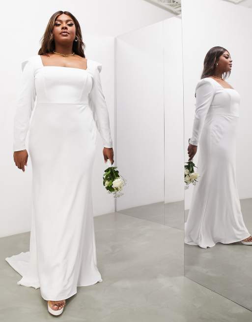 Woman Showing Panties during Bridal Gown Fitting Stock Photo