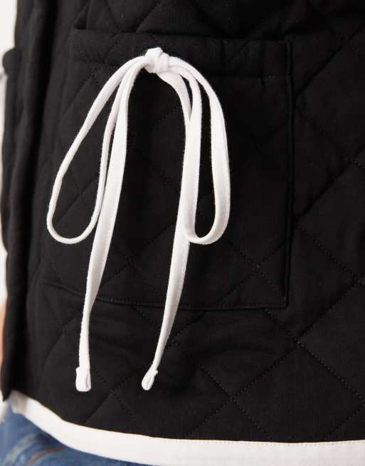 ASOS DESIGN Curve gilet with quilted contrast binding design and bow pocket detail in black, 2 of 4