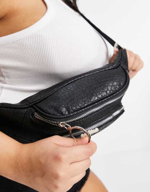 ASOS DESIGN Curve fanny pack in black