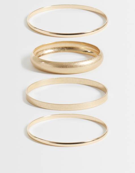ASOS DESIGN Curve – Guldfärgade och borstade armringar med olika design, 4-pack - view 1
