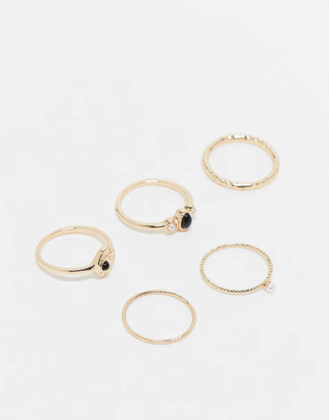 ASOS DESIGN Curve – Guldfärgade ringar med svarta stenar och fuskpärlor, 5-pack - view 1