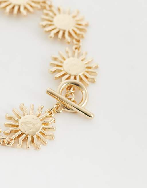 ASOS DESIGN Curve – Guldfärgat armband med t-stav och liten soldesign, 2 av 3