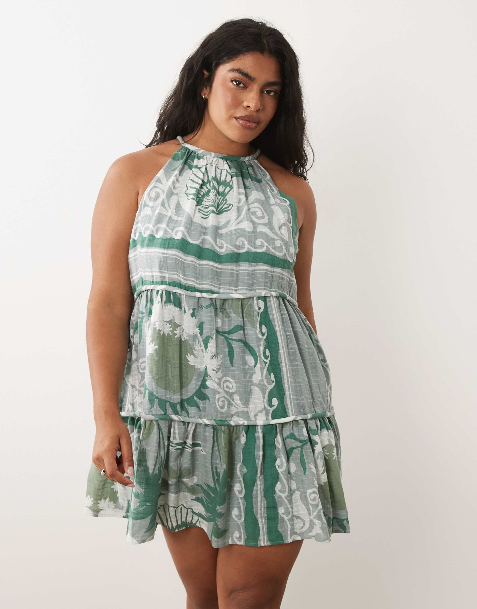 asos design curve halter neck tiered mini sundress with chunky binding in mixed blue print